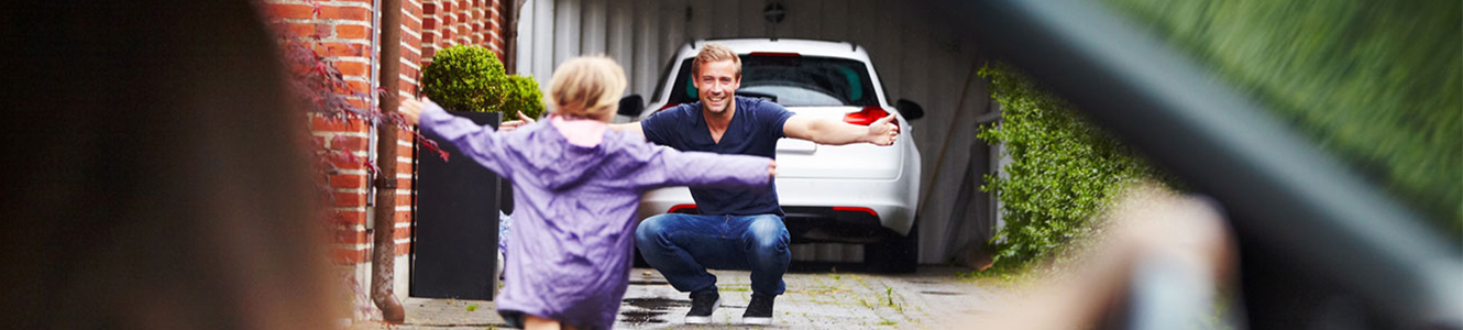 Child running to father image